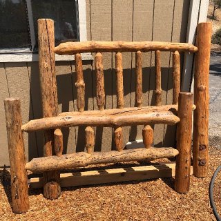Photo of Rustic Wood Bed