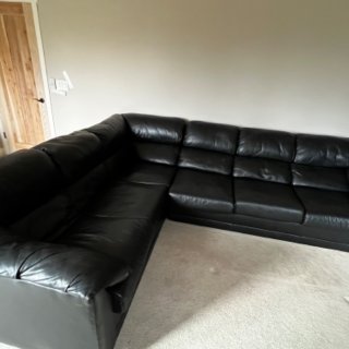 Photo of Leather sectional sofa with queen sleeper