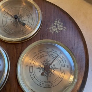 Photo of Old sailors thermometer, barometer, and humidity