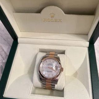 Photo of 36mm Rose Gold Explorer with an oyster bezel