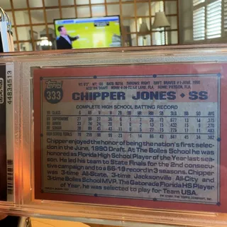 Photo of 1991Topps number 1 draft pick of Chipper Jones Authentic signature 