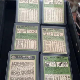 Photo of Lots of Topps 66’ cards one Mickey Mantle