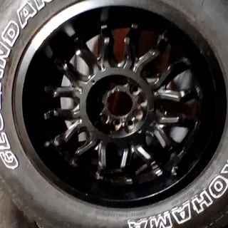 Photo of Mickey Thompson rims and Yokohama tires