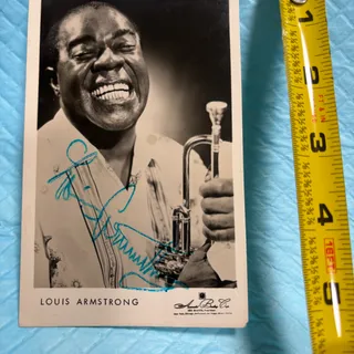 Photo of Louis Armstrong autographed B&W photo 