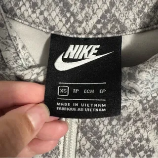 Photo of Nike Python Gray and White Snakeskin Long Sleeve Bodysuit