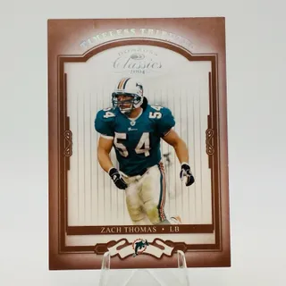 Photo of Zach Thomas #50 2004 Donruss Classics Dolphins Timeless Tributes Red /100