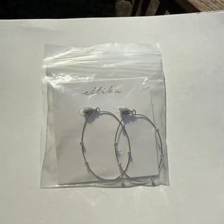 Photo of Ettika Delicate Crystal Large Oval Hoop Earrings Silver Rhodium CZ