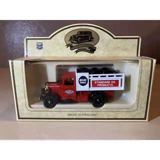 Photo of Lledo Days Gone 1934 Ford Model A Stake Truck Chevron Atlas Tyres 1/64 Scale