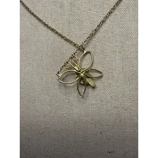 Photo of vintage gold-tone butterfly necklace with a green jade cabochon pendant