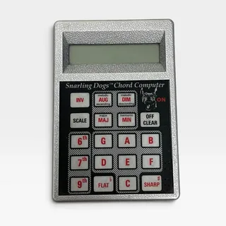 Photo of Vintage Snarling Dogs Electronic Chord Computer