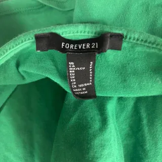 Photo of Green crop top message me