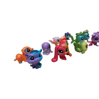 Photo of 12 Pcs collection of Hasbro Littlest Pet Shop (LPS) mini figures. 