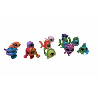 Photo of 12 Pcs collection of Hasbro Littlest Pet Shop (LPS) mini figures. 