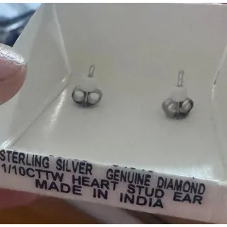 Photo of Sterling Silver 1/10 ct. tw Genuine Diamond Stud Earrings