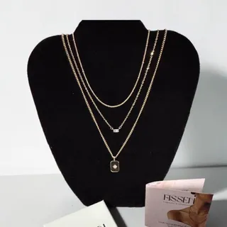 Photo of Fissen gold starburst layered necklace delicate