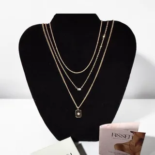 Photo of Fissen gold starburst layered necklace delicate