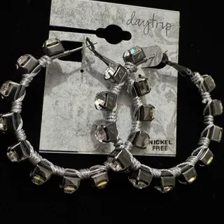 Photo of Daytrip silver hoop earrings 2' Bullet Grunge