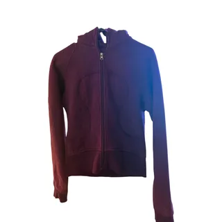 Photo of purple lululemon Scuba Full-Zip Hoodie features the brand's iconic logo stitched