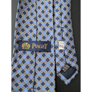 Photo of Highly Sought After Vintage Piaget 100% Silk Men's Blue Tie With Multicolor Designs