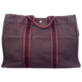 Photo of Hermes Toile Fourre Tout Mm Burgundy Fabric Tote
