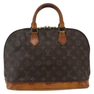 Photo of Louis Vuitton Monogram Alma Handbag Brown