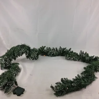 Photo of WBHome 9ft Pre-lit Flocked Christmas Garland Snow Dusted Battery Operated Timer