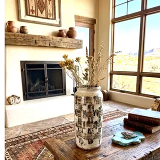 Photo of Hand-thrown studio pottery vase textured impasto glaze earthy palette signed