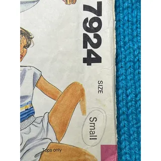 Photo of McCalls 7924 Sewing pattern knit top polo boat neck size small