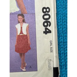 Photo of McCalls 8064 Sewing pattern girls apron dress bolero 1980s Size Small