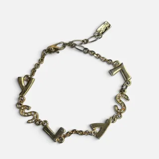 Photo of Vintage YSL Yves Saint Laurent Gold-Tone Crystal Letter Charm Chain Bracelet
