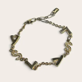 Photo of Vintage YSL Yves Saint Laurent Gold-Tone Crystal Letter Charm Chain Bracelet