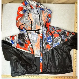 Photo of Nike floral *Hyper Femme* crop windrunner jacket & dri fit leggings