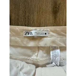 Photo of Zara Women's High Rise Flare Cream Colored Pants Size Small
