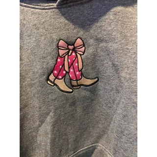 Photo of Simply Southern Happy Camper Hoodie with cowboy boots