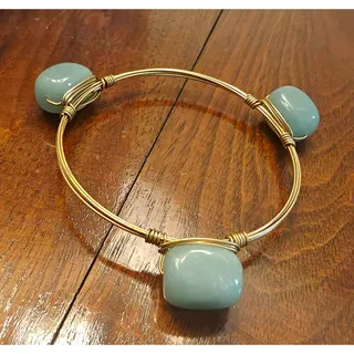 Photo of Gold Tone Wire Wrap Bangle Bracelet with 3 Blue Oval Stones, Metal