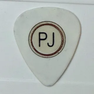 Photo of Authentic 2010 Pearl Jam Backspacer Tour Guitar Pick.
