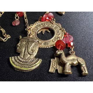 Photo of Vintage Korea Brass Charm Necklace 16 Charms 28in