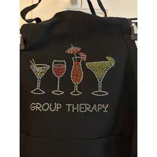 Photo of Black Apron with Rhinestone Cocktail Glasses and "Group Therapy" Text