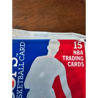 Photo of 1989-1990 NBA Hoops Unopened Pack w/#80 Patrick Ewing on top - New York Knicks