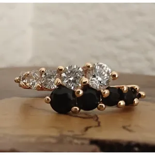 Photo of Gold Tone Prong Set Round Black & Clear Stone Band Ring