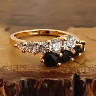 Photo of Gold Tone Prong Set Round Black & Clear Stone Band Ring