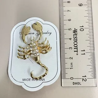 Photo of Golden Scorpion Rhinestone Brooch – Fierce Elegance with Vintage Glam Spark new