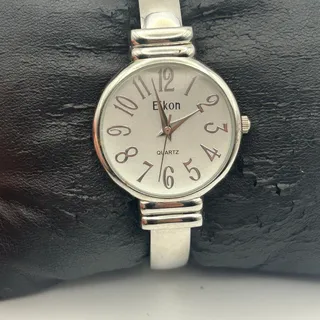 Photo of Eikon Silver-tone Exaggerated Hourly Numbers Women’s Bangle Watch Working