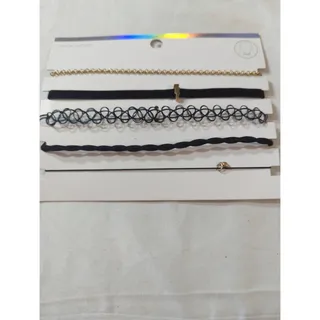 Photo of 5 pack choker one gold chain choker one black choker with gold lighting charm one black plastic choker circle design one black twist choker one black thin choker with white rhinestone charm