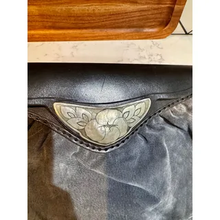 Photo of vintage grey suede black leather clutch bag silver-tone metal floral accent 80s