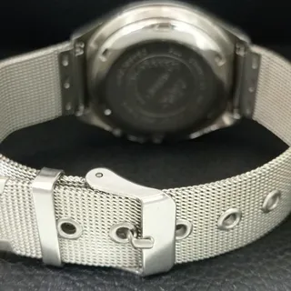 Photo of Vintage 1984 Orient Automatic Mens Silver Watch W/daydate & White accents