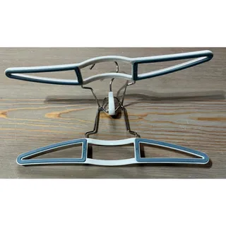 Photo of 13 White Plastic Clamp-Style Skirt/Pant Hangers  
