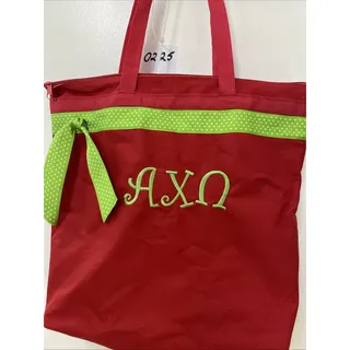 Photo of ALPHA CHI OMEGA Red Fabric With Green Ribbon Zip Tote Bag 16”X 16”