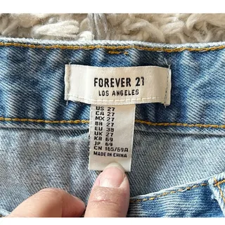 Photo of Forever 21 Medium Wash Distressed Denim Skirt Women's Size 27
