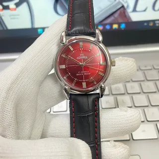 Photo of Vintage 1983 Roamer Manual Mens Silver Watch W/Leather Strap & Red accents
